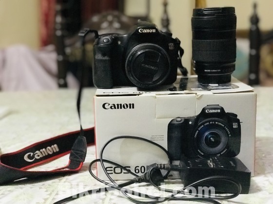 Canon 60d with 50mm prime & 18-135lense in original box